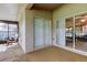 Spacious covered patio features a seating area and sliding door access to the home's interior at 10103 Old Tampa Bay Dr, San Antonio, FL 33576