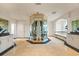 Spacious bathroom with unique glass shower, dual vanities, and a luxurious soaking tub at 1058 Roundstone Pl, Palm Harbor, FL 34683