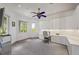 Bright office space featuring custom built-ins, desk area, and comfortable carpet flooring at 1058 Roundstone Pl, Palm Harbor, FL 34683