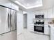 Bright eat-in kitchen featuring stainless steel appliances and abundant counter space at 12083 Rockford St, Spring Hill, FL 34608