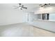 Open-concept space seamlessly connects the living room with the modern kitchen at 12083 Rockford St, Spring Hill, FL 34608