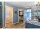 En-suite bath with double sinks, enclosed shower, and a separate toilet room at 12215 Adventure Dr, Riverview, FL 33579