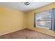 Bright bedroom with a large window at 12215 Adventure Dr, Riverview, FL 33579