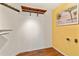 Bright closet space with wall shelving and hanging rods at 12215 Adventure Dr, Riverview, FL 33579