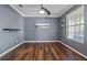 Bright office space featuring hardwood floors and natural light at 12215 Adventure Dr, Riverview, FL 33579