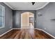 Spacious home office featuring hardwood floors, archway and natural light at 12215 Adventure Dr, Riverview, FL 33579