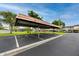 Covered carport with ample parking space, providing protection from the elements and convenience for residents and guests at 129 Lakeview Way, Oldsmar, FL 34677