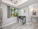 Cozy eat-in kitchen nook with view to outdoor landscaping at 129 Lakeview Way, Oldsmar, FL 34677