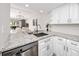 Bright kitchen featuring granite countertops and stainless steel appliances at 129 Lakeview Way, Oldsmar, FL 34677