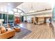 A spacious and inviting lobby with seating, beautiful decor, and ample natural light at 129 Lakeview Way, Oldsmar, FL 34677