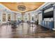 Elegant clubhouse interior with stylish furnishings, ample seating, and large windows offering scenic views at 13102 Foxtail Fern Dr, Riverview, FL 33579