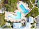 Aerial view of a sparkling community pool with a kiddie area and lap lanes at 13102 Foxtail Fern Dr, Riverview, FL 33579