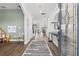 Inviting foyer with wood floors and an open view of the home's interior at 13102 Foxtail Fern Dr, Riverview, FL 33579