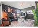 Modern home office space features a built-in desk setup and eclectic decor providing inspiration and creativity at 13102 Foxtail Fern Dr, Riverview, FL 33579
