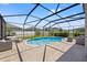 Backyard pool area featuring lounge seating and a screened enclosure for outdoor enjoyment at 13102 Foxtail Fern Dr, Riverview, FL 33579