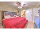 Large main bedroom with ceiling fan and connected bathroom and closet at 13210 Arbor Isle Dr # 207, Temple Terrace, FL 33637