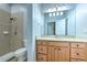 Bathroom featuring a walk-in shower, toilet, and vanity at 1408 Brilliant Cut Way, Valrico, FL 33594