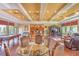 Open clubhouse area featuring a pool table, TV, kitchen area and seating at 1408 Brilliant Cut Way, Valrico, FL 33594