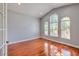 Bright office space with hardwood floors, vaulted ceilings, large arched windows, and a serene atmosphere at 1408 Brilliant Cut Way, Valrico, FL 33594
