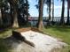 Outdoor horseshoe pit and game area, a fun amenity for residents at 1657 Glengarry Dr, Palm Harbor, FL 34684