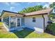 Comfortable sunroom with windows allowing natural light to fill the space at 1657 Glengarry Dr, Palm Harbor, FL 34684