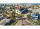 Aerial view of condos highlighting a prime location near the beach, pool, and dedicated parking spaces at 187 145Th E Ave # 3, Madeira Beach, FL 33708