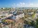 Modern condo building with well-maintained landscaping, private parking, and a shared pool, located near the beach at 187 145Th E Ave # 3, Madeira Beach, FL 33708