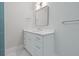 Modern bathroom featuring a white vanity, framed mirror, and modern fixtures at 187 145Th E Ave # 3, Madeira Beach, FL 33708