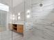 Luxury bathroom featuring dual sinks, modern vanities, and a large marble shower at 187 145Th E Ave # 3, Madeira Beach, FL 33708