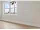 Bright bedroom features natural light from a large window with beautiful outdoor views at 187 145Th E Ave # 3, Madeira Beach, FL 33708