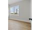 This room has light-colored wood floors, a large window offering a view at 187 145Th E Ave # 3, Madeira Beach, FL 33708