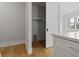 Open laundry room area features open shelving at 187 145Th E Ave # 3, Madeira Beach, FL 33708