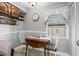 Charming breakfast nook with window provides a cozy space for dining, enhancing the home's appeal at 19029 Us Highway 19 N # 26-204, Clearwater, FL 33764