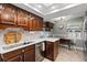 Cozy kitchen boasts bright countertops, mosaic backsplash and dining nook for casual meals at 19029 Us Highway 19 N # 26-204, Clearwater, FL 33764
