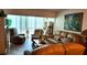 Inviting living room with plush furnishings, large windows for natural light, and elegant decor at 19029 Us Highway 19 N # 8-13, Clearwater, FL 33764