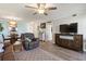 Open living room featuring a dining area and comfortable seating for relaxing at 19029 Us Highway 19 N # 9-407, Clearwater, FL 33764
