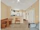 Light-filled living area with a dining nook and an open layout into the kitchen at 1910 E Palm Ave # 11216, Tampa, FL 33605
