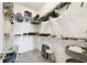 Well-organized walk-in closet with shelving, rods, and ample storage space at 19325 Hawk Valley Dr, Tampa, FL 33647