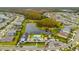 Aerial view of a beautiful community with ponds, a clubhouse and a pool at 19719 Cypress Bridge Dr, Odessa, FL 33556