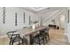 Dining room with wooden table, modern chairs, and stylish wall decor at 19719 Cypress Bridge Dr, Odessa, FL 33556
