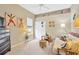 Bedroom with neutral colored walls and eclectic wall art at 20749 Auburn Leaf Trl, Land O Lakes, FL 34638