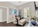 Bright office space with a large window and functional workspace setup at 20749 Auburn Leaf Trl, Land O Lakes, FL 34638
