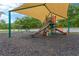 Community playground with slide and swing set, providing a fun and safe environment for children to play and exercise at 20749 Auburn Leaf Trl, Land O Lakes, FL 34638
