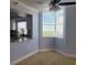 Cozy dining area adjacent to the kitchen with scenic views, featuring a ceiling fan and a bright, airy atmosphere at 2333 Feather Sound Dr # B511, Clearwater, FL 33762
