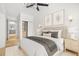 Comfortable main bedroom with neutral tones, closet space, and stylish décor at 2410 W Azeele St # 228, Tampa, FL 33609