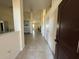 Inviting foyer with tile flooring and high ceilings, leading into the main living areas at 26357 Trinilas Dr, Punta Gorda, FL 33983
