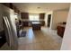 Spacious kitchen with granite counters, stainless appliances, and center island at 26357 Trinilas Dr, Punta Gorda, FL 33983