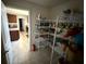 Walk-in pantry with wire shelving providing ample storage space at 26357 Trinilas Dr, Punta Gorda, FL 33983