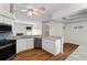Kitchen with stainless steel appliances and granite countertops open to the dining area at 2803 Bent Leaf Dr, Valrico, FL 33594