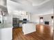 Spacious kitchen and living room featuring stainless steel appliances and granite countertops at 2803 Bent Leaf Dr, Valrico, FL 33594